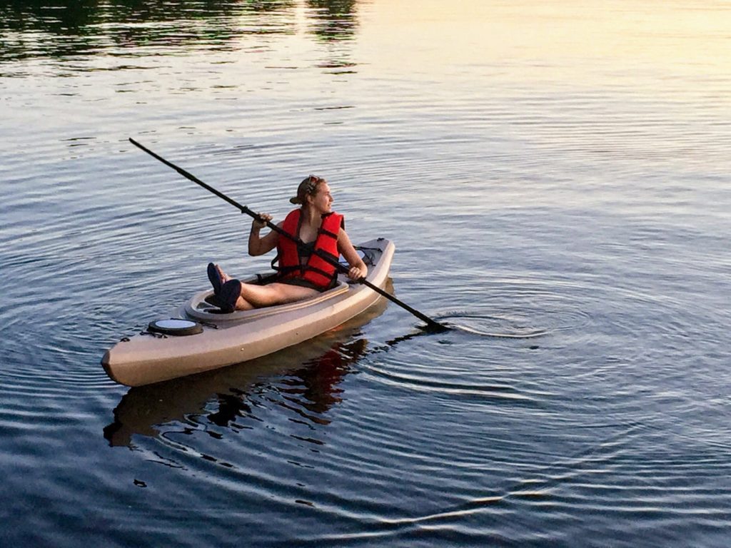 Young Lady on Lake Michigan on her Kayak