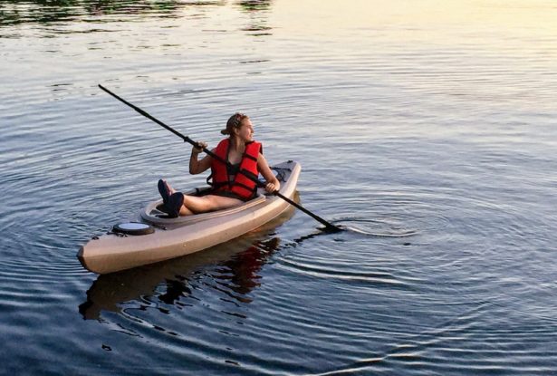 Young Lady on Lake Michigan on her Kayak