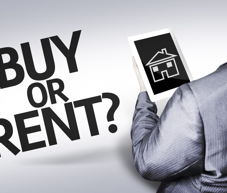 Man holding a tablet with a house on it with text that says buy or rent?