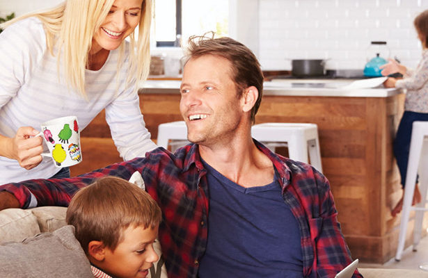 Happy family spending time together in home