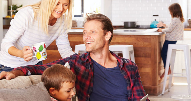 Happy family spending time together in home