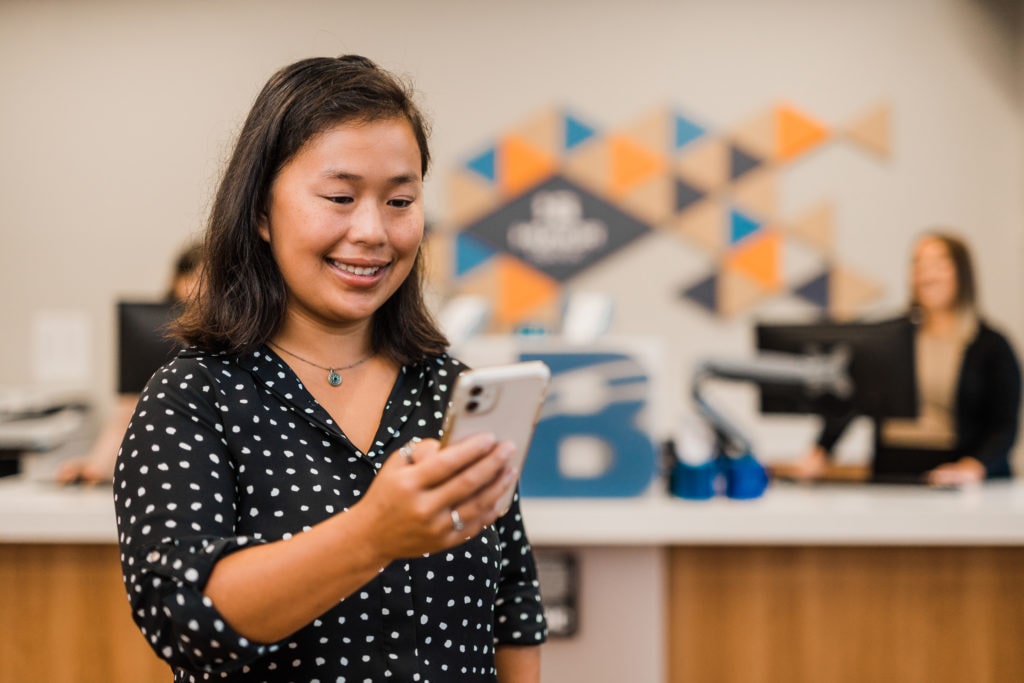 Client accessing to online banking with her phone